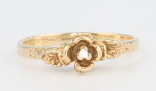 A 14ct yellow gold diamond set floral ring, size L 