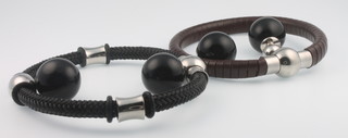 Two pairs of silver mounted ear studs together with 2 leather mounted bracelets 