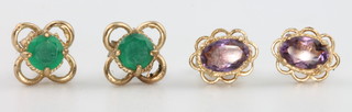 Two pairs of 9ct yellow gold earrings set amethysts and green stones 