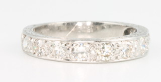 An 18ct white gold half eternity ring size H 