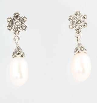 A pair of paste and pearl earrings