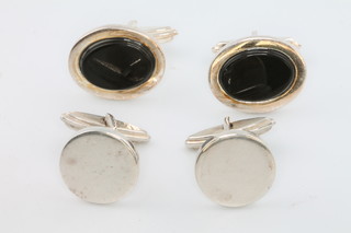 Two pairs of silver cufflinks 