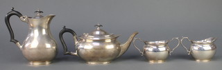A silver 4 piece tea and coffee set of plain form with ebony mounts. Sheffield 1936/37 Gross 139 grams 