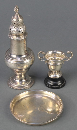 A George III silver shaker. London 1817 a ditto trophy cup and dish 154 gr