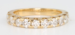 An 18ct yellow gold half eternity ring size L 