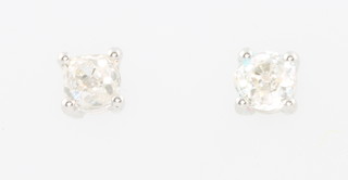 A pair of white gold single stone diamond ear studs, each approx 0.25ct 