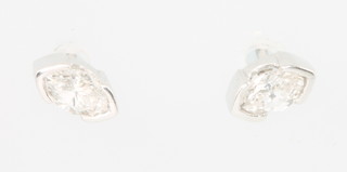A pair of 18ct white gold marquise cut diamond ear studs, each approx 0.2ct 