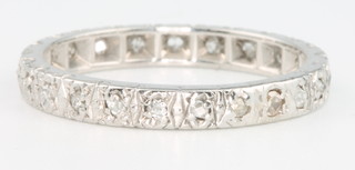 An 18ct white gold eternity ring size Q