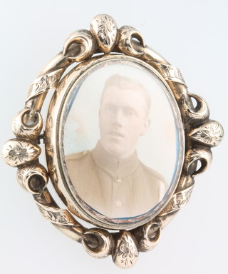 A Victorian silver gilt portrait brooch