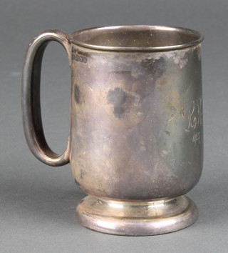 A silver mug with engraved monogram Birmingham 1927 125 grams