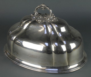 An Edwardian silver plated meat cover with fancy scroll handle 18" 
