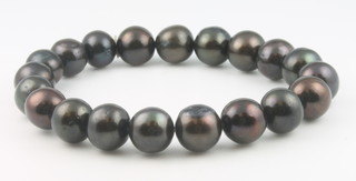 A cultured black pearl bracelet 