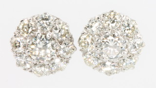 A pair of 18ct white gold diamond cluster earrings approx. 2ct