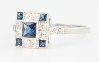 An 18ct white gold Art Deco style sapphire and diamond ring size O 