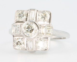 An 18ct white gold Edwardian style ring with brilliant and baguette cut diamonds approx. 1.45ct size M 