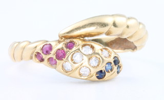 An 18ct yellow gold diamond, ruby and sapphire snake ring, size R