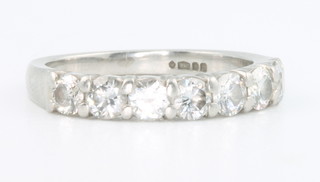 A platinum and 7 stone diamond ring, size J 