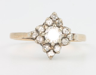 A 9ct yellow gold diamond ring size N 1/2