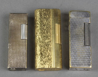 A gentleman's silver plated Dunhill cigarette lighter, a gilt ditto and a Calibri ditto 