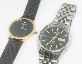 A gentleman's gilt cased black dial Raymond Weil wristwatch and 1 other
