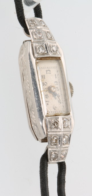 A lady's Art Deco platinum and diamond cocktail watch on a silk strap 