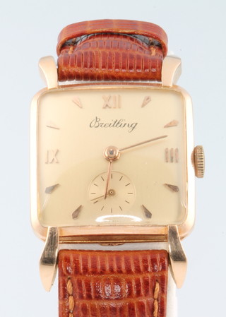 A gentleman's Breitling 18ct yellow gold cased wristwatch with seconds at 6 o'clock no. 395676 on a leather strap 