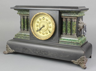 E N Welch, an American 8 day striking mantel clock with gilt metal dial contained in an ebonised architectural case 
