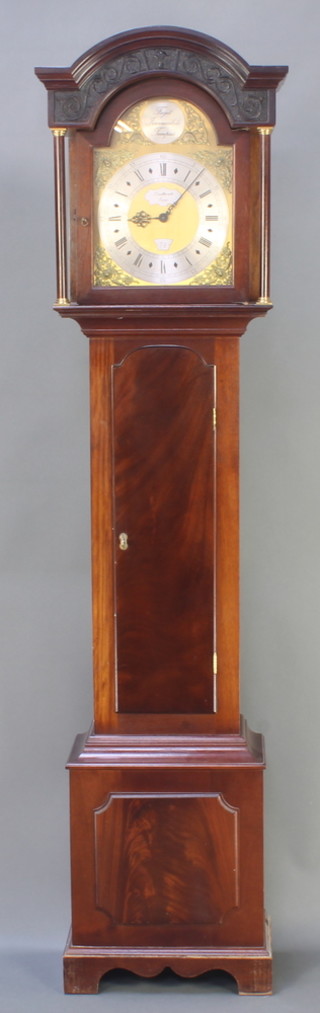 Sallcombe of Essex, a limited edition chiming longcase clock no. 74/250, the 11 1/2" arched gilt dial with silver chapter ring and Roman numerals, marked Sallcombe Essex 74, contained in a mahogany case 77"h  