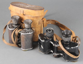 A pair of Voigtlander 5 x 25 binoculars no.41114 (eye piece missing) together with a pair of GP Goerz binoculars x9, cased 