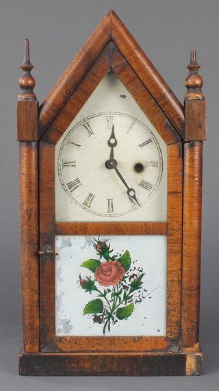 A Jerome and Company 19th Century American shelf clock contained in a walnut case  
