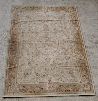 A yellow ground Aubusson style rug 79" x 54" 