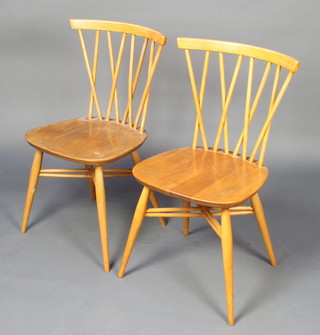 A pair of Ercol light elm candlestick bar back chairs, model 376