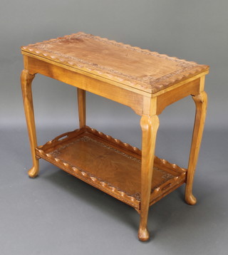 A rectangular carved Kashmir hardwood card table with detachable tray to the base, raised on cabriole supports 29"h x 32"w x 16"d 