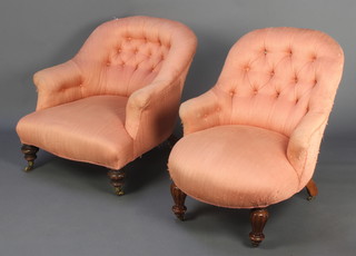 A Victorian Howard style tub back chair upholstered in orange buttoned material together with a similar chair raised on reeded supports