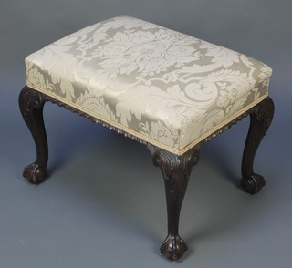 A Georgian style rectangular carved mahogany stool with upholstered seat on cabriole, ball and claw supports 18"h x 24"w x 18"d 