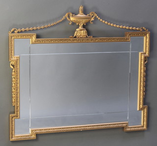 A Georgian style rectangular shaped bevelled plate and cut glass mirror contained in a gilt frame surmounted by an urn 30 1/2"h x 34"w  