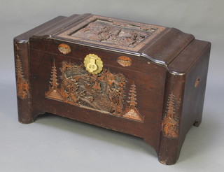 A carved camphor coffer with hinged lid 23"h x 40 1/2"w x 21"d 