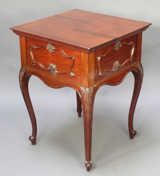 A 1930's mahogany surprise table of square form with hinged lid and carved panels to the sides, raised on cabriole supports 31 1/2"h x 24"