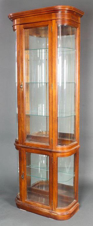 A 19th Century style D shaped display cabinet with mirrored back, fitted shelves enclosed by glazed panelled doors 76 1/2"h x 28 1/2"w x 14"d 