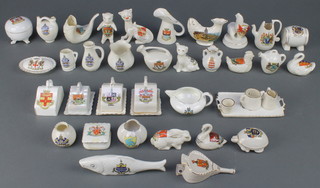A quantity of crested china including barrel, cheese dish and cover and carp