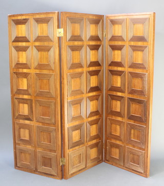 A mahogany panelled 3 fold screen 62"h x 22 1/2" when closed x 68" when open 