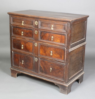A Jacobean oak chest with geometric mouldings, fitted 2 short and 3 long drawers, raised on bracket feet 37"h x 38"w x 19 1/2"d 