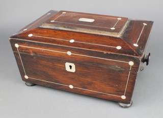 A Victorian rosewood trinket box of sarcophagus form inlaid mother of pearl stringing and with tore handles to the sides, raised on bun feet 5 1/2"h x 12"w x 9"d 