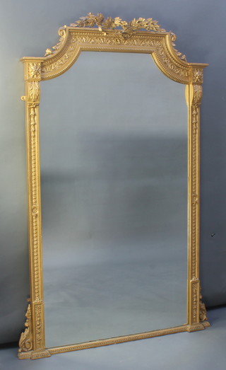 A 19th Century shaped plate mirror contained in a decorative gilt frame with acanthus leaf decoration 72"h x 44"w 