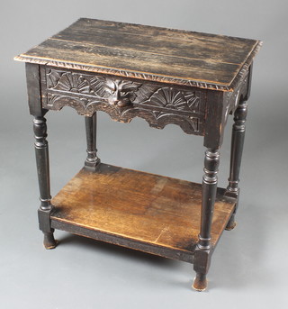 A Victorian carved oak side table fitted a drawer, raised on turned supports with undertier 28"h x 26"w x 18"d 