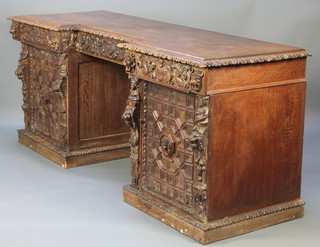 A Victorian heavily carved oak inverted breakfront pedestal sideboard fitted 2 short drawers above cupboards enclosed by heavily panelled doors and with 1 long drawer to the centre, the left drawer carved ANNO and the right drawer carved 1674 38"h x 92 1/2"w x 31"d 