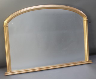 A 19th Century style arched plate over mantel mirror contained in a decorative gilt frame 33 1/2" x 49" 