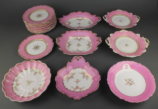 A Victorian part dessert service with pink and gilt ground and floral decoration comprising 5 plates and 4 shaped dishes, together with a similar service with pink and gilt ground and gilt decoration comprising 11 plates and 3 tazzas 