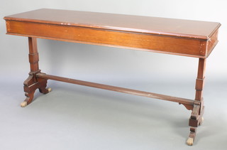 A 19th Century style rectangular centre table raised on standard end supports with paw feet and H framed stretcher 32"h x 65"w x 22"d 