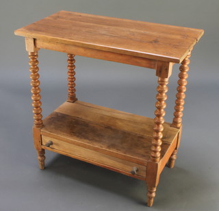 A 19th Century rectangular pine wash stand, the top constructed of 3 planks and raised on bobbin turned supports with undertier, the base fitted a drawer 30"h x 29 1/2" x 15"d 